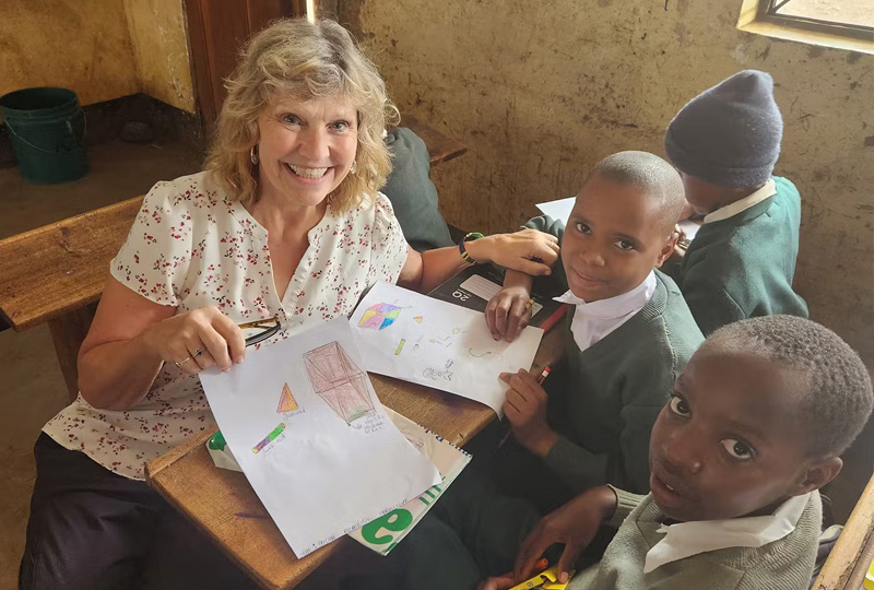 how volunteers help improve education in tanzania